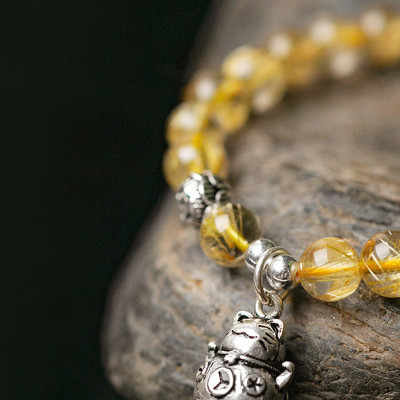 Vòng tay đá thạch anh tóc vàng charm mèo thần tài mệnh thủy, kim - Ngọc Quý Gemstones