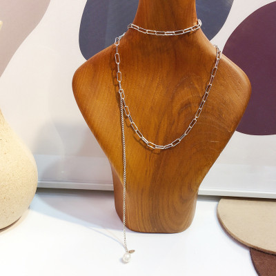 Dây chuyền titan thả tua rua ngọc trai độc đáo