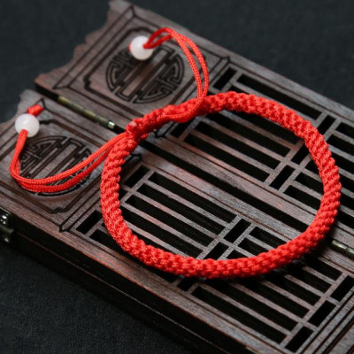 Vòng tay nam nữ bện chỉ đỏ tròn đính 2 hạt ngọc CD19