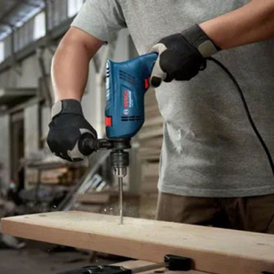 Máy khoan động lực Bosch GSB 600 set 100 món 600W, bảo hành 12 tháng