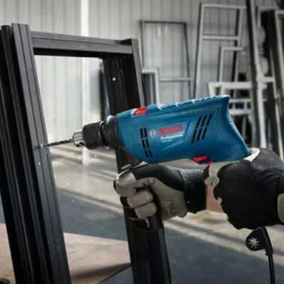 Máy khoan động lực Bosch GSB 600 set 100 món 600W, bảo hành 12 tháng