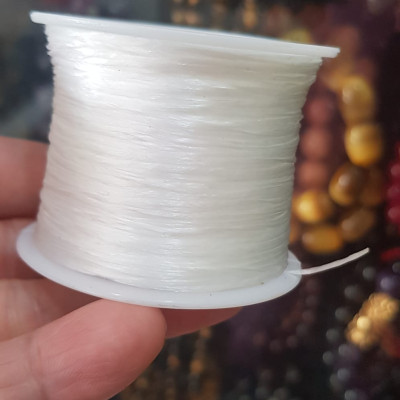 Cuộn Dây Thun CO GIÃN màu Trắng xỏ vòng hạt chuỗi Dây này là dây thun chuyên xỏ vòng chuỗi màu Trắng, có đủ màu Anh Chị đang đeo chuỗi muốn thay dây khác cho vòng thì đặt cuộn Thun chỉ này nhé 
