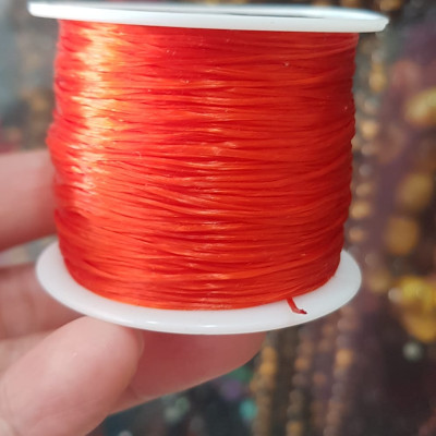 Cuộn Dây Thun CO GIÃN màu Đỏ xỏ vòng hạt chuỗi                                   Dây này là dây thun chuyên xỏ vòng chuỗi màu Đỏ, có đủ màu .. Anh Chị đang đeo chuỗi muốn thay dây khác cho vòng thì đặt cuộn Thun chỉ này nhé