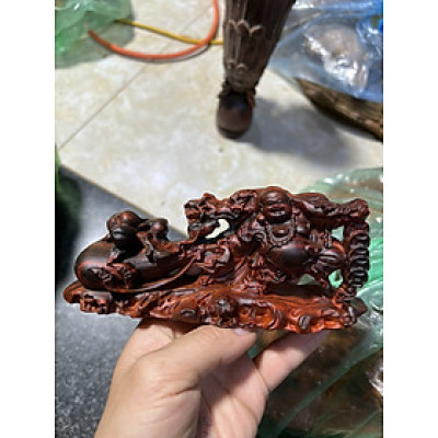 Tượng phật di lặc kéo bao tiền mini bằng gỗ trắc đỏ đen kt 15×7×4cm