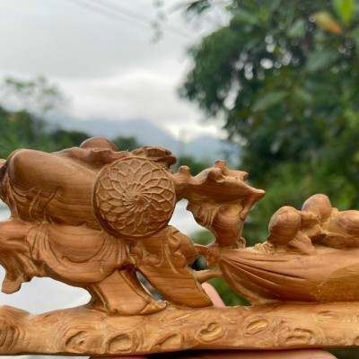 Tượng phật di lặc kéo bao tiền  mini  bằng gỗ ngọc am thơm phức kt 20×9×6cm