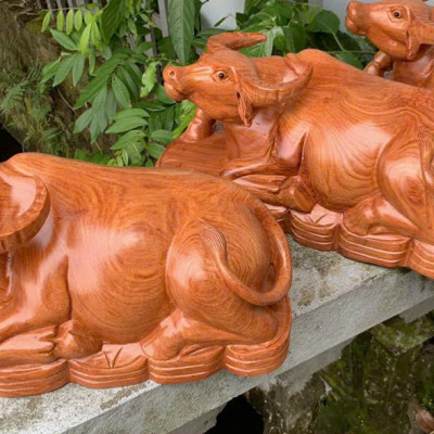 Tượng con trâu phong thủy gỗ hương đá kt 40cm