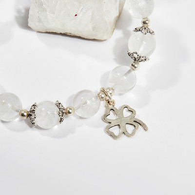 Vòng tay phong thủy nữ đá thạch anh ưu linh trắng charm cỏ 4 lá 8mm mệnh thủy , kim - Ngọc Quý Gemstones