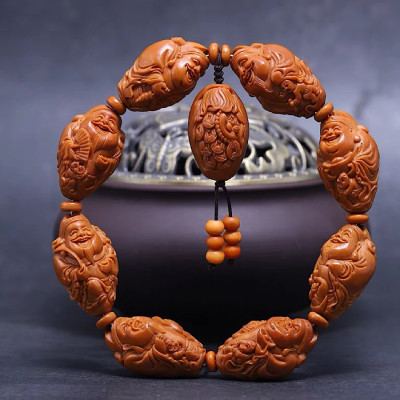 VÒNG CHUỖI THẦN TÀI BÁT PHƯƠNG TỤ TÀI - THU HÚT TÀI LỘC 8 PHƯƠNG HẠT OLIU CHẠM KHẮC