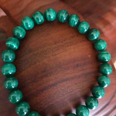 VÒNG TAY ĐÁ MALACHITE HAY CÒN GỌI LÀ ĐÁ LÔNG CÔNG MÀU XANH 7LY5 HỢP NỮ MẠNG MỘC HOẢ