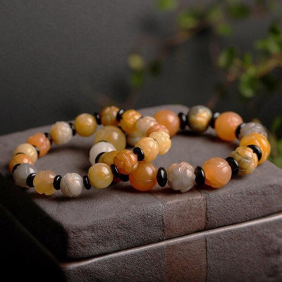 Vòng tay khắc hoa sen cho người mệnh hỏa , kim và thổ