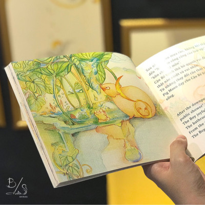 Sách hay - Sách thiếu nhi - Truyện cổ tích song ngữ Anh Việt "TRÂU VÀNG VÀ CẬU BÉ – Sự huyền diệu của Ánh Trăng" - Art book - Pig Moon Bookstore