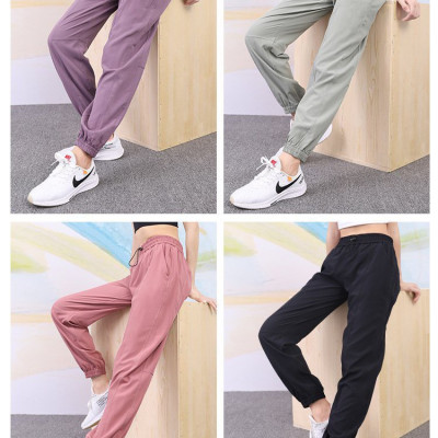 Quần Jogger Nữ Chất Vải Gió Dù Phong Cách Thể Thao